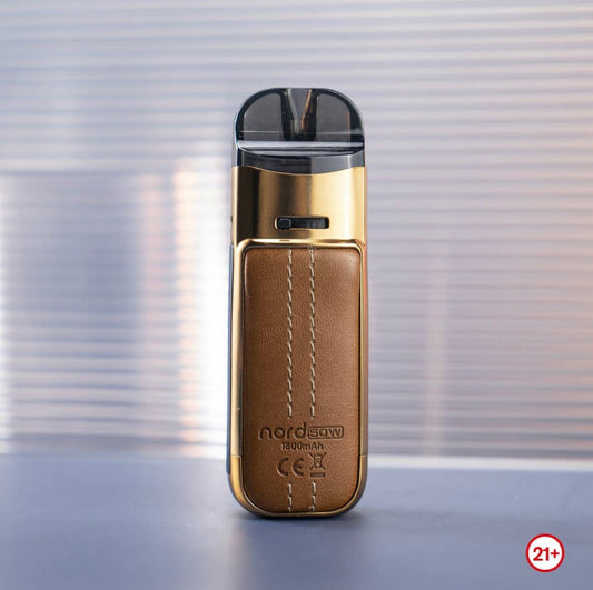 SMOK NORD 50W Pod Kit in gold and brown leather finish with 1800mAh battery and adjustable airflow, ideal for premium vaping experience.