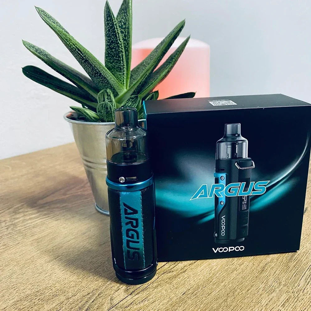 VOOPOO ARGUS 40W Pod Mod Kit in blue displayed next to branded packaging on a wooden table, ideal for retail presentation.