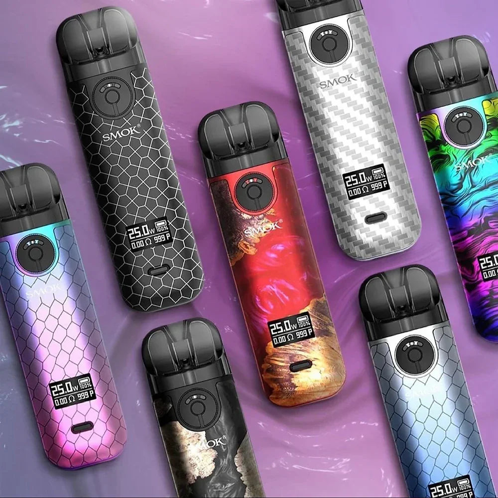 Multiple SMOK NOVO 4 Pod Kits - 25W in various colors and finishes with OLED screens on, showcasing adjustable wattage and stylish options.