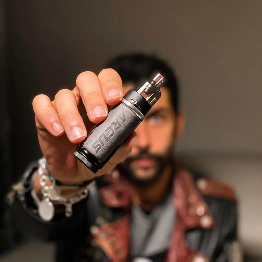 VOOPOO ARGUS 40W Pod Mod Kit shown in hand, highlighting its compact design and ergonomic grip for portable vaping convenience.