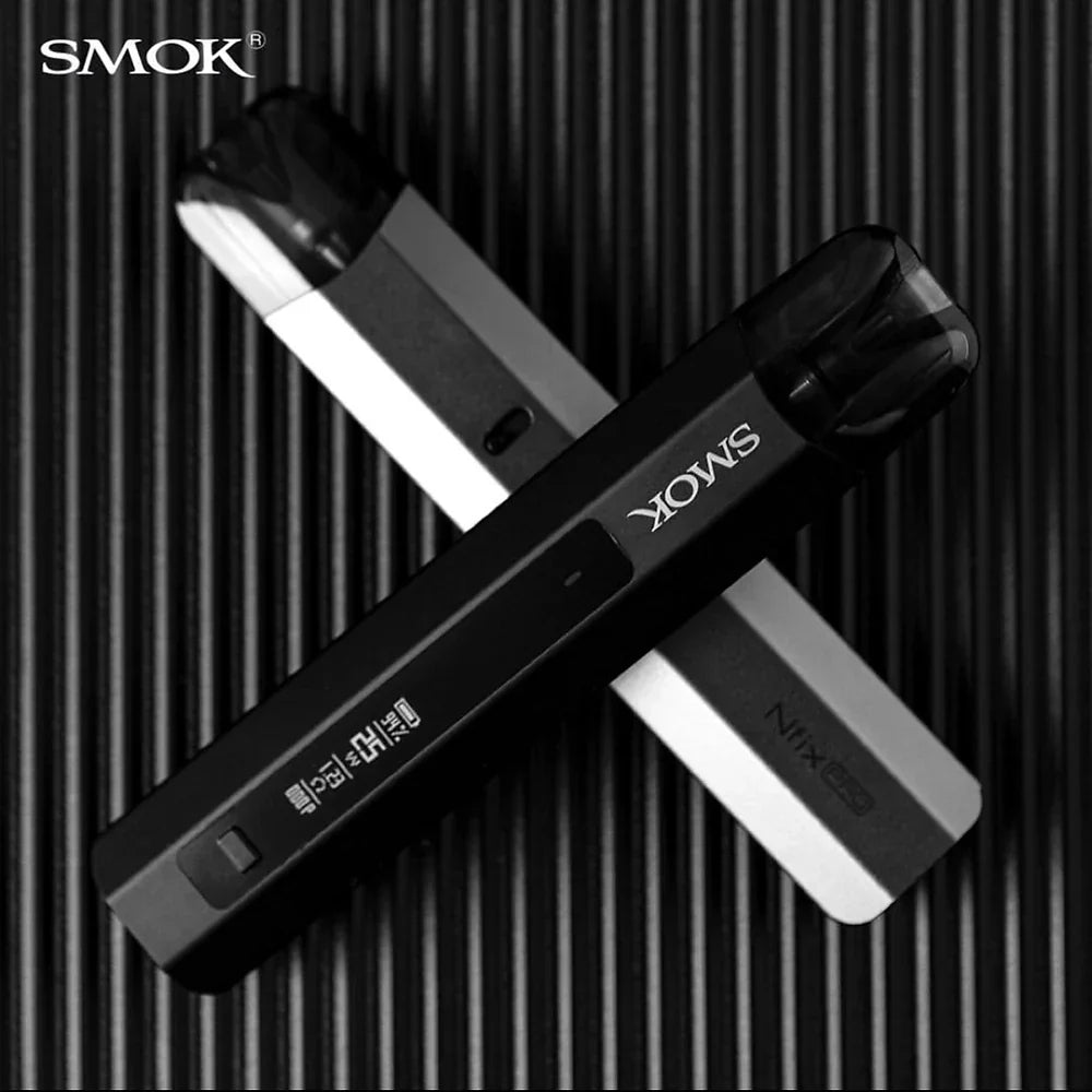 Black and silver SMOK NFIX PRO Pod System - 25W vape devices crossed on a textured black surface, showcasing minimalist design.
