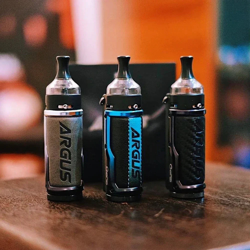 Three VOOPOO ARGUS 40W Pod Mod Kits in silver, blue, and black lined up, highlighting color variety and sleek leather-textured finish.