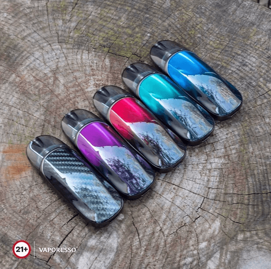 Vaporesso ZERO 2 Pod Kit - Stylish Pod System in five vibrant colors displayed on a wooden surface, ideal for personalized vaping choices.