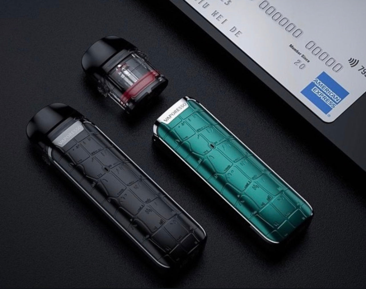 Black and green Vaporesso Luxe Q Pod Systems with refillable pods, showcasing sleek design and 1000mAh battery for vaping convenience.